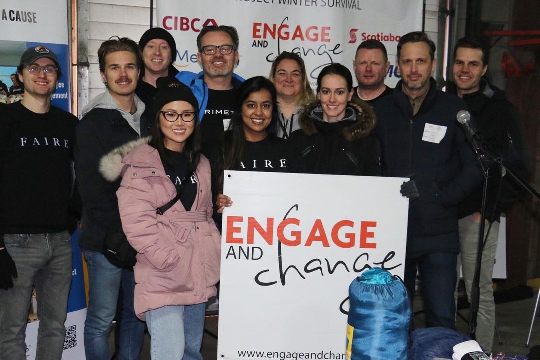 Group of Perimeter staff at an event giving back to the community